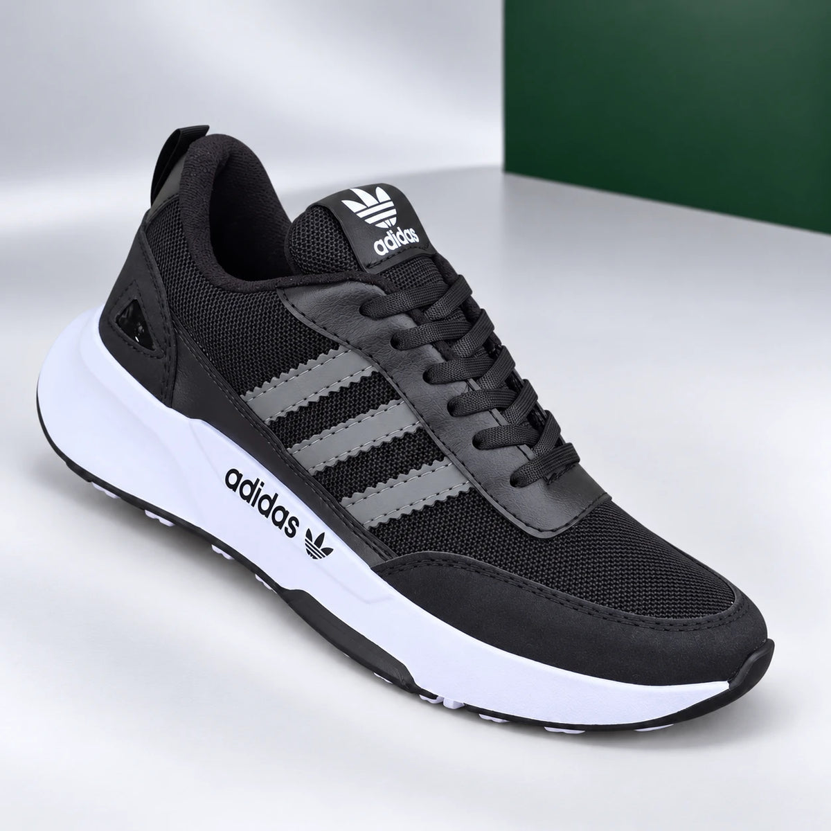 TENIS DEPORTIVO ADI negro blanco